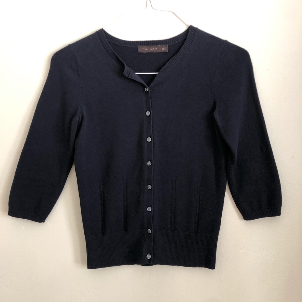 Navy blue cardigan.